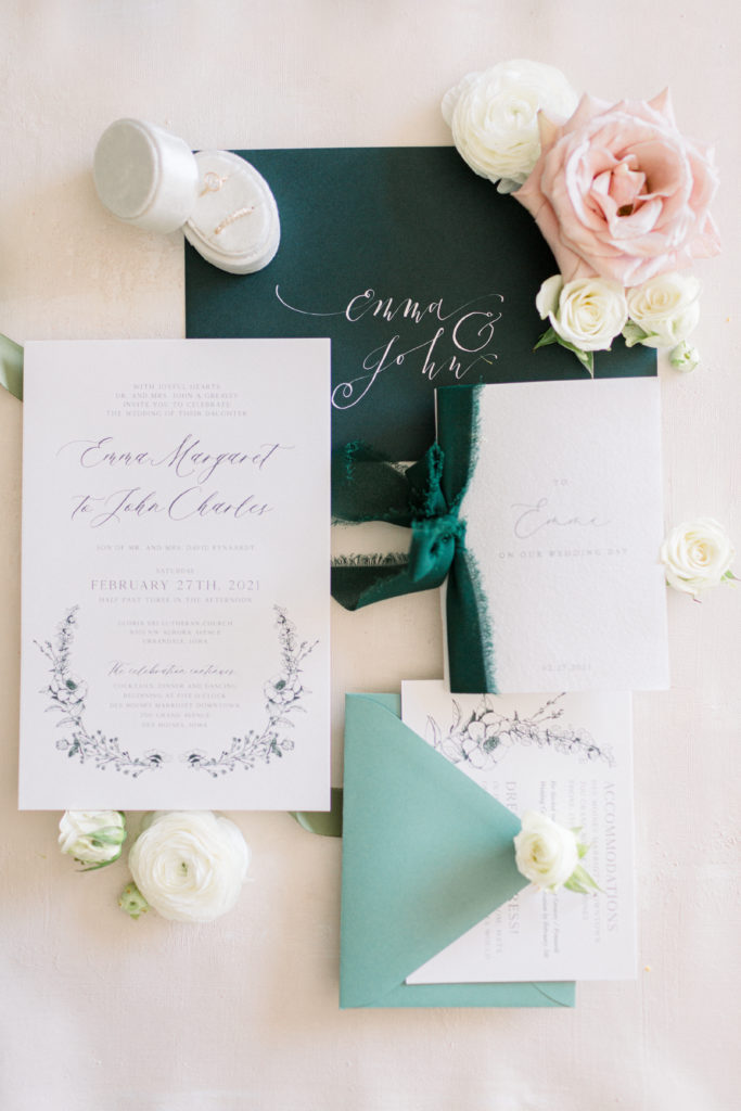 Toronto wedding invitation flat lay with green envelope