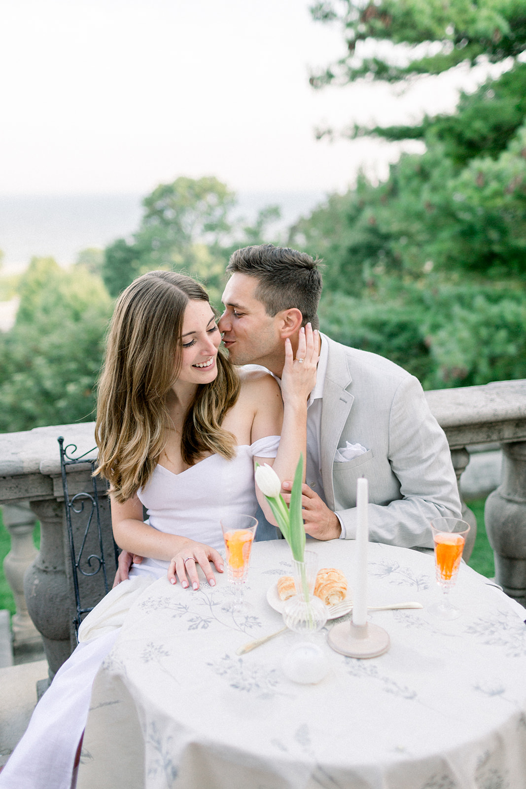 couple kissing on italian terrace